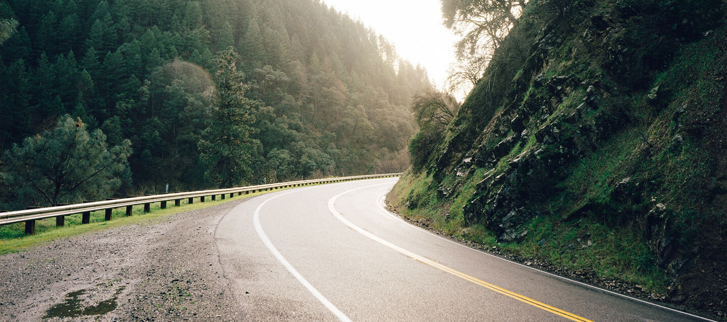 Road turning corner to a brighter place